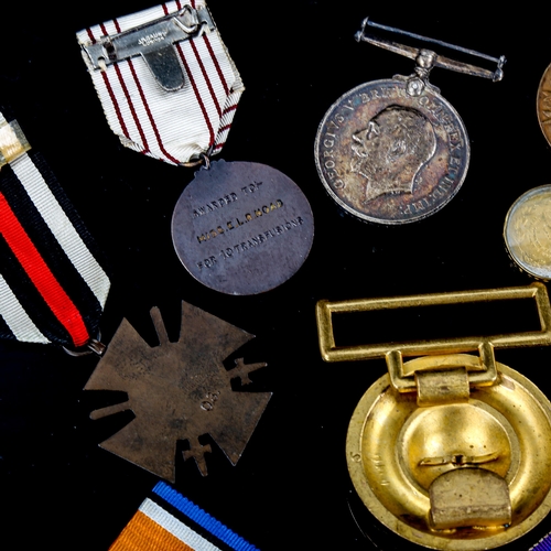 1103 - A group of medals, including pair of Great War medals to 204223 Pte A G Harman 1st London Regiment, ... 