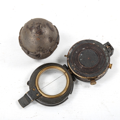 1104 - A Great War German egg grenade, circa 1917 (inactive), length 5.5cm, and a military trench compass (... 