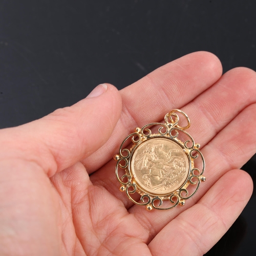 1109 - An Edward VII 1909 gold half sovereign, 3.9g, with 9ct gold frame, 3.9g