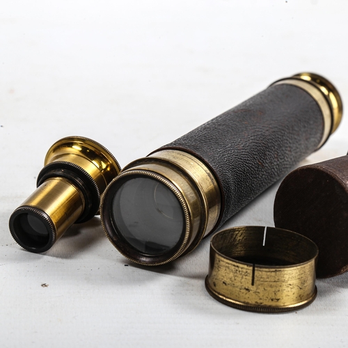 1118 - A small leather-bound brass 3-draw pocket telescope, lens diameter 2.5cm, length opened 42cm, with s... 