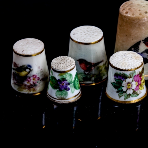 1129 - A group of 7 Worcester and Coalport China thimbles, largest height 3cm (7)