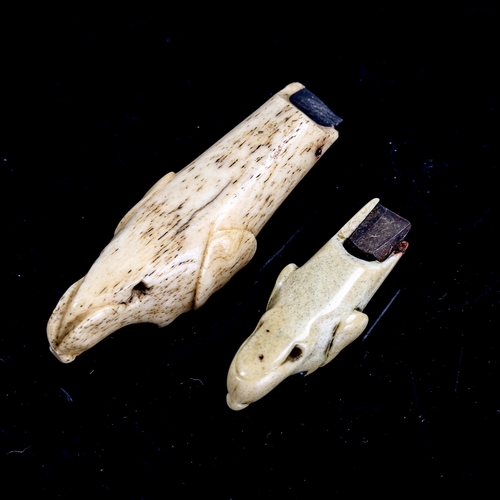 1135 - 2 Antique carved bone dog's head design whistles, 18th or 19th century, length 7cm and 4.5cm