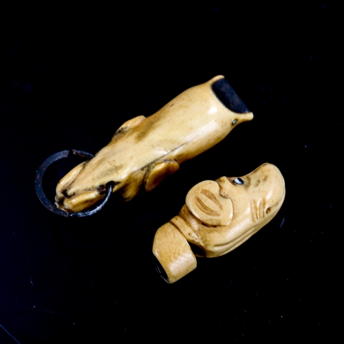 1136 - 2 Antique carved bone dog's head design whistles, 18th or 19th century, length 5.5cm and 4cm