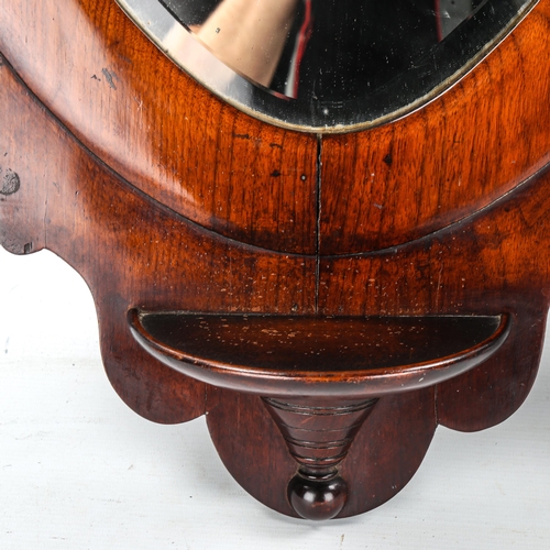 1145 - A pair of Victorian mahogany-framed heart-shaped wall mirrors, height 55cm, 1 missing shelf bracket