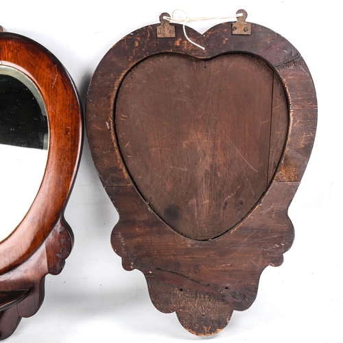 1145 - A pair of Victorian mahogany-framed heart-shaped wall mirrors, height 55cm, 1 missing shelf bracket