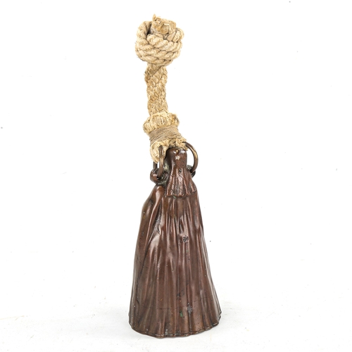 1147 - A patinated bronze hand bell, in the form of an Elizabethan woman, height 20cm