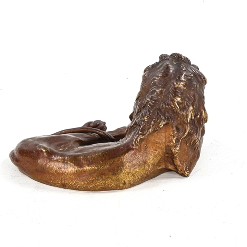 1148 - FRANZ BERGMAN - patinated bronze sculpture, reclining lion, serial no. 6045, length 20cm