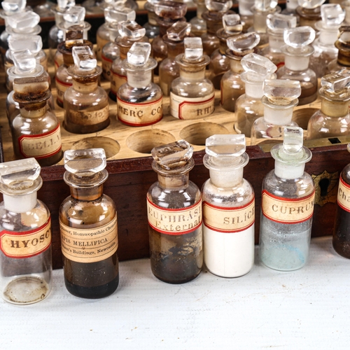 1161 - A 19th century mahogany homeopathic medicine chest, containing original glass jars by Mawson of Newc... 