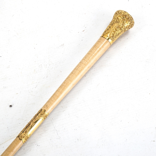 1185 - A 19th century satinwood and gilt-metal mounted conductor's baton, in original velvet-lined Morocco ... 