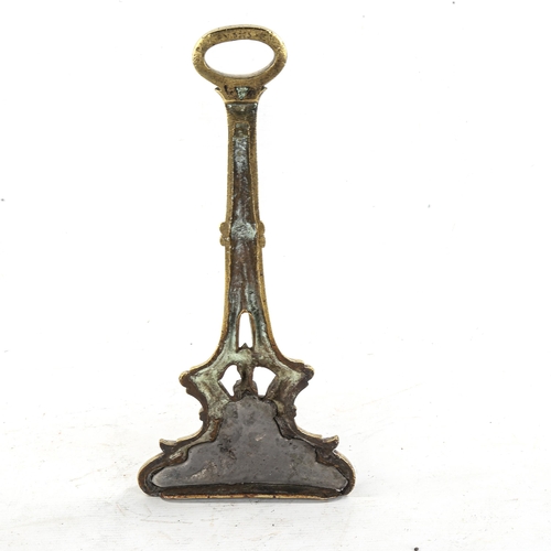 1186 - A Victorian cast-brass doorstop, height 34cm