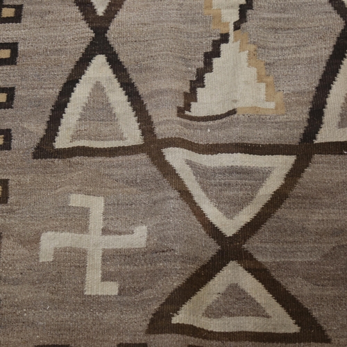 1192 - A handwoven Navajo rug, 160cm x 117cm