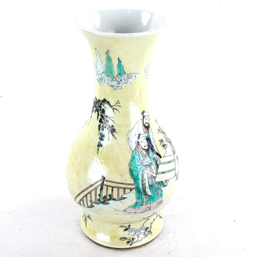 1206 - A Chinese yellow glaze porcelain vase, with painted figures and trees, 6 character mark, height 32cm