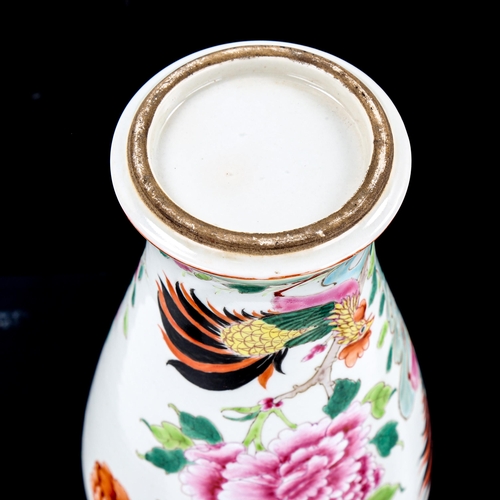 1209 - A Chinese white glaze porcelain vase, with enamel exotic birds, height 23cm