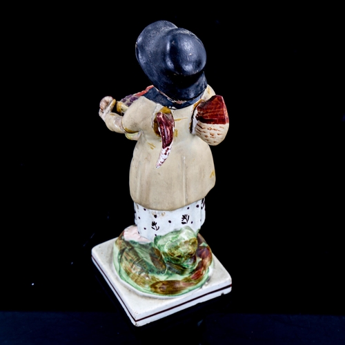 1223 - 18th century Staffordshire Pearlware figure of a fruit seller, height 16cm (A/F)