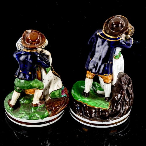 1234 - A pair of Chelsea Derby amorous country figures, largest height 19cm