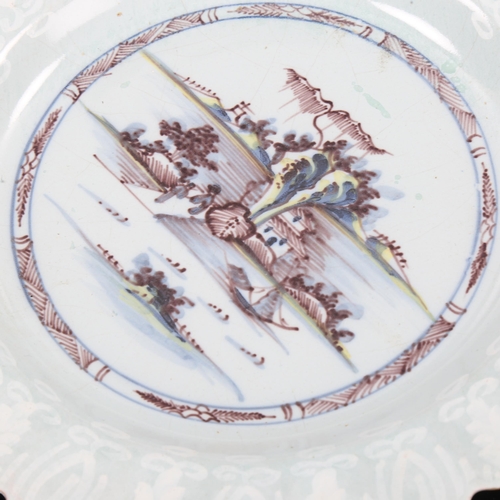 1253 - Antique Delft pale blue glaze pottery plate, with painted landscape, diameter 22cm