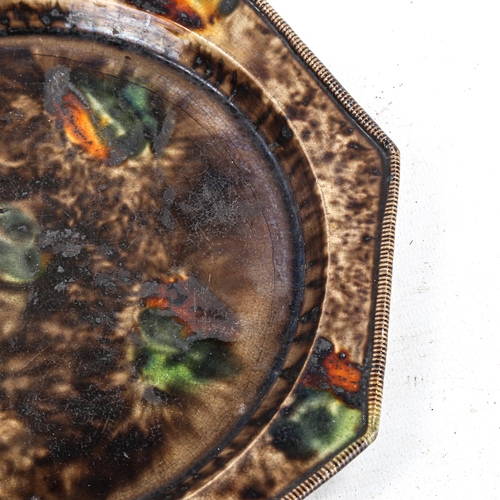 1254 - 19th century octagonal pottery plate, with tortoiseshell effect mottle glaze, label verso from Freet... 