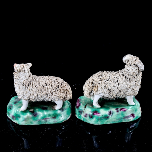 1263 - A pair of early 19th century Chelsea Derby porcelain sheep, height 7cm