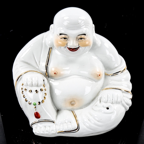 1273 - A Chinese white glaze porcelain Buddha, height 23cm, and a standing figure, height 20cm (2)