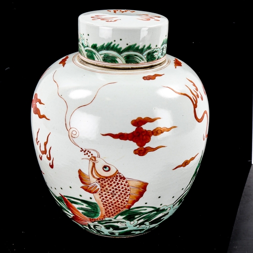 1276 - A Chinese famille verte porcelain jar and cover, with painted dragons, height 25cm