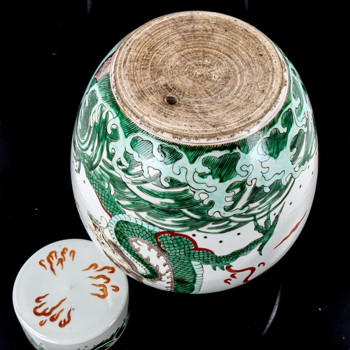 1276 - A Chinese famille verte porcelain jar and cover, with painted dragons, height 25cm