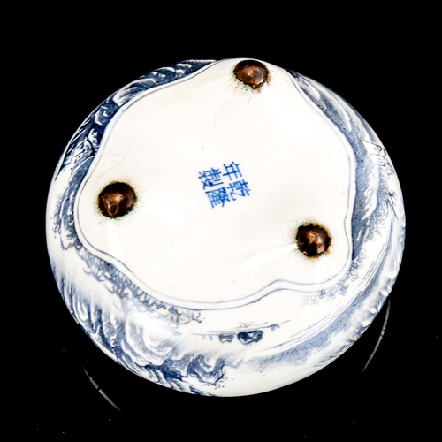 1311 - A small Chinese enamel brush pot, with painted landscape scenes and text, diameter 7.5cm