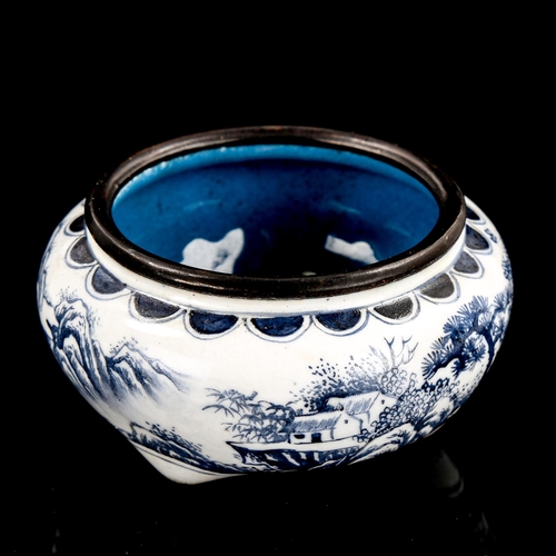 1311 - A small Chinese enamel brush pot, with painted landscape scenes and text, diameter 7.5cm