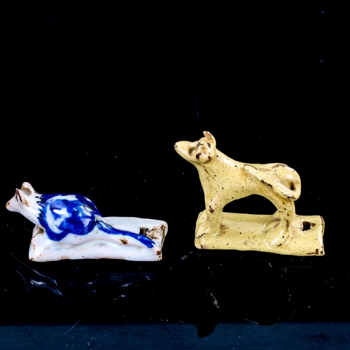 1325 - A 19th century tin-glazed pottery whistle, in the form of a rat, length 6.5cm, and a yellow glaze po... 