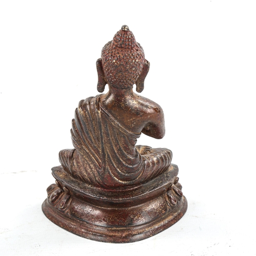 1342 - An Oriental patinated bronze seated Buddha, height 16cm