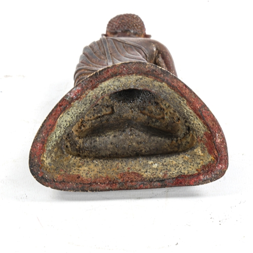 1342 - An Oriental patinated bronze seated Buddha, height 16cm