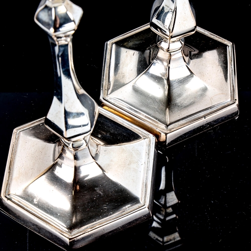 1347 - A pair of Art Deco heavy gauge silver plate on bronze candlesticks, height 24cm