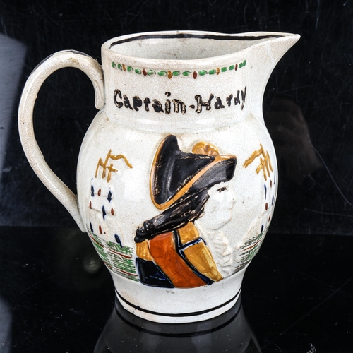 1363 - A Prattware Admiral Nelson and Captian Hardy ceramic jug, circa 1805, relief moulded profiles, heigh... 