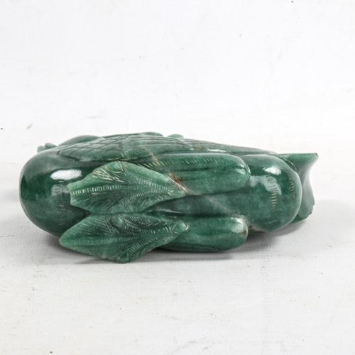 1367 - A Chinese carved greenstone bird, on hardwood stand, height 16cm