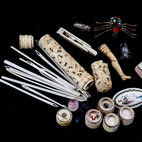 1377 - A group of antique ivory and bone items, including a sectional seal holder, 3 stone seals, and paste... 