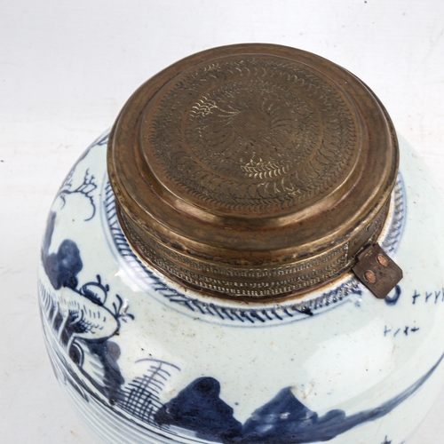 1408 - A Chinese blue and white porcelain jar, with painted landscape scenes and metal cover, height 24cm