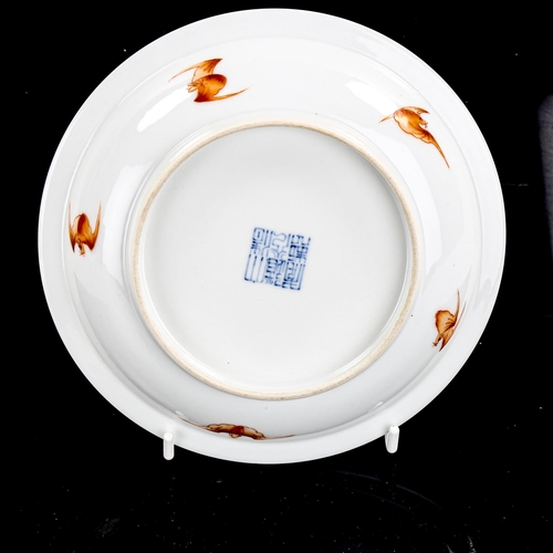 1433 - A Chinese white glaze porcelain dish with painted enamel flowers, seal mark, diameter 16cm