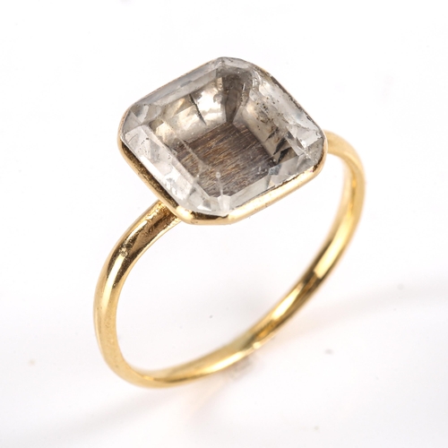 100 - A mid-18th century rock crystal hair panel memorial ring, unmarked gold closed-back settings, with s... 