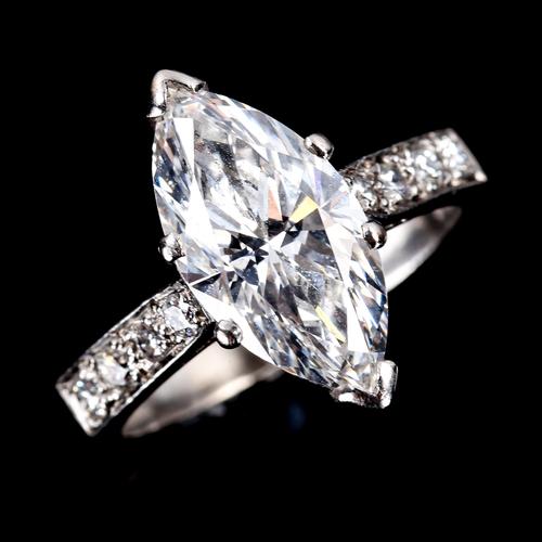 105 - A 3.70ct marquise brilliant-cut solitaire diamond ring, graduated round brilliant-cut diamond should... 