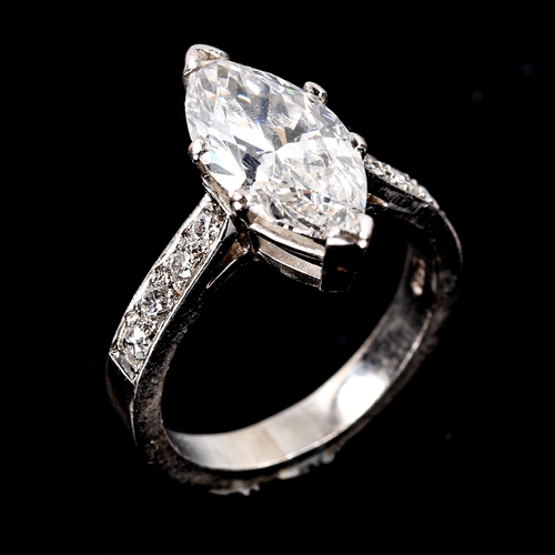 105 - A 3.70ct marquise brilliant-cut solitaire diamond ring, graduated round brilliant-cut diamond should... 