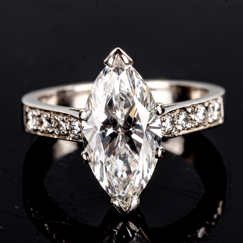 105 - A 3.70ct marquise brilliant-cut solitaire diamond ring, graduated round brilliant-cut diamond should... 