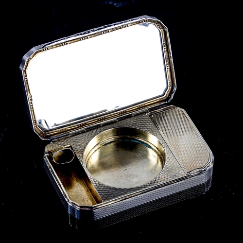 168 - A lady's Art Deco silver and blue enamel vanity case, allover engine turned decoration with gilt int... 