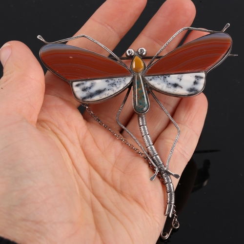 216 - A large Scottish silver and hardstone figural dragonfly brooch, chased and engraved detailing with c... 