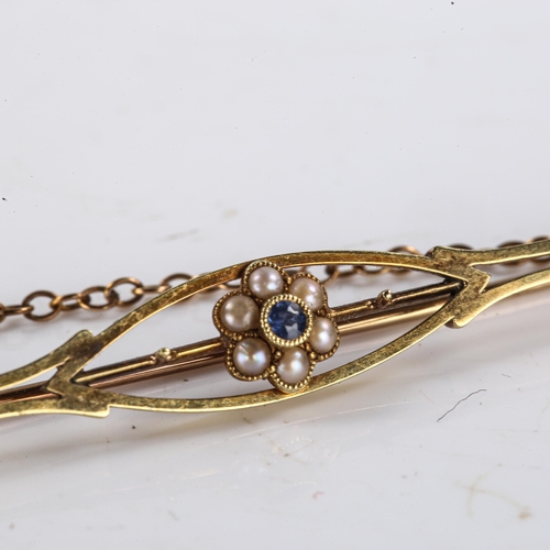 226 - An Edwardian 15ct gold sapphire and split pearl brooch, openwork floral design, brooch length 57.2mm... 