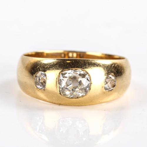 228 - A Victorian 3-stone diamond gypsy ring, unmarked gold settings with old cut diamonds, total diamond ... 