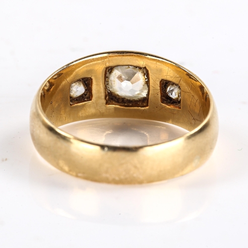 228 - A Victorian 3-stone diamond gypsy ring, unmarked gold settings with old cut diamonds, total diamond ... 