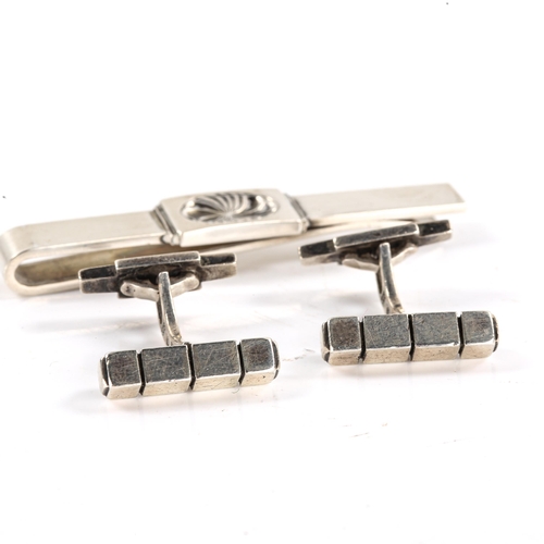 231 - GEORG JENSEN - a Danish sterling silver tie clip and pair of cufflinks, both designed by Henry Pilst... 