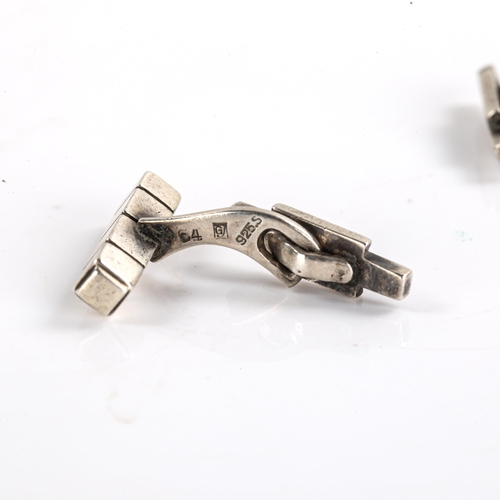 231 - GEORG JENSEN - a Danish sterling silver tie clip and pair of cufflinks, both designed by Henry Pilst... 