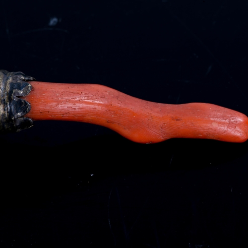 237 - A Victorian silver gilt baby's rattle, relief embossed foliate decoration with bells and coral teeth... 