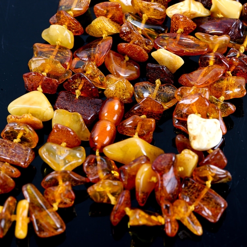 240 - A long specimen amber bead necklace, necklace length 144cm, 60g