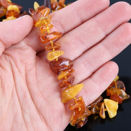 240 - A long specimen amber bead necklace, necklace length 144cm, 60g